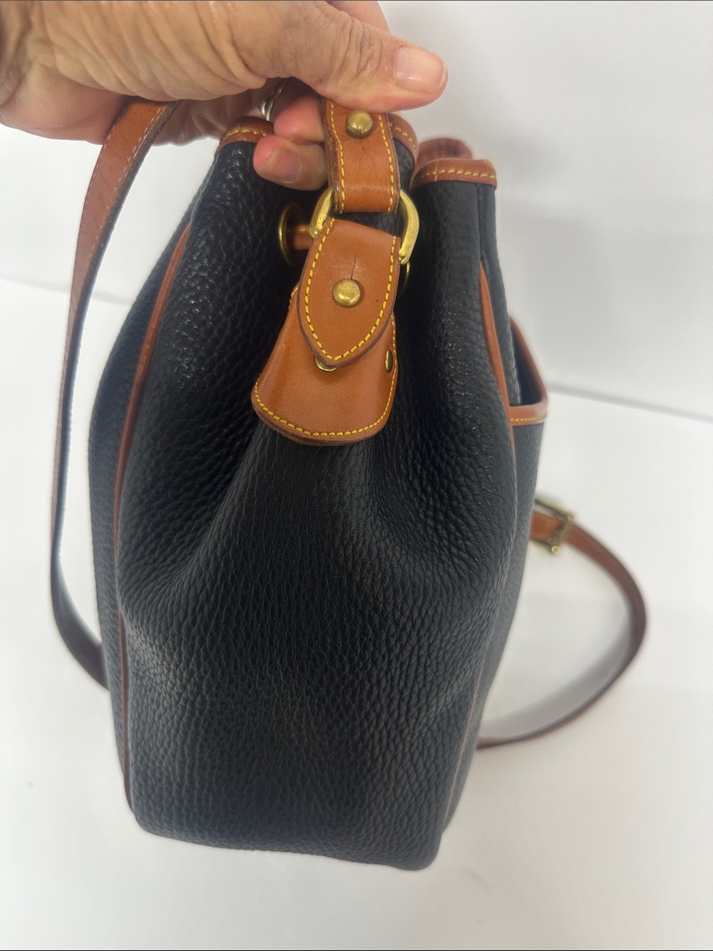 Dooney & Bourke Black Pebbled Leather Drawstring Bucket Bag with Tan Trim - Picture 3 of 13